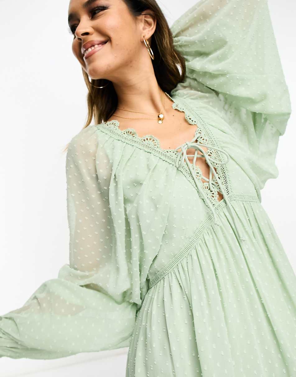 ASOS DESIGN lace trim plunge batwing mini dress with pep hem in sage texture