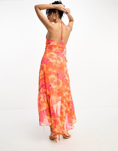 ASOS DESIGN cowl neck ruffle detail hi-low hem midi slip dress with tie side in orange floral print