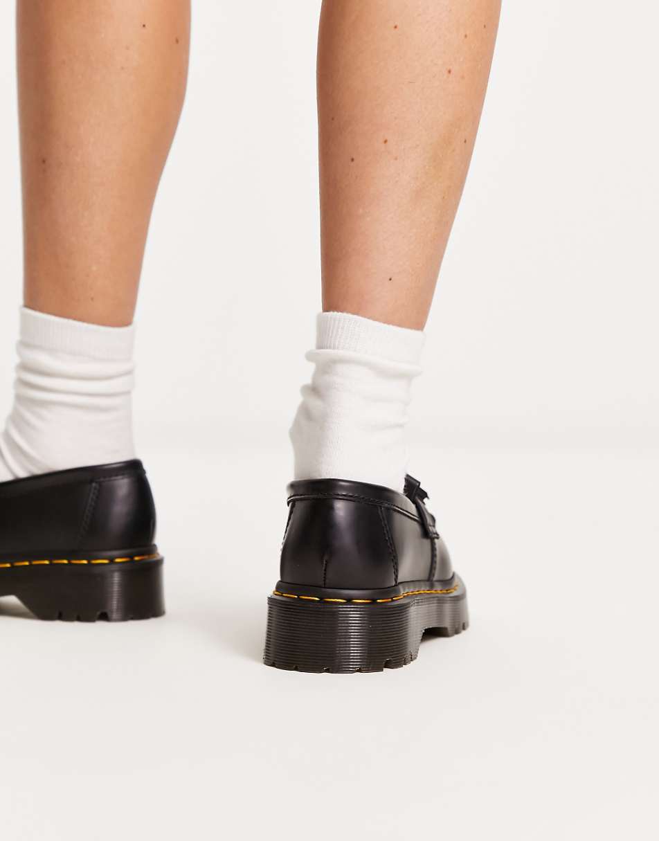 Dr Martens Adrian quad flatform loafers in black