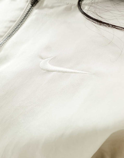Nike mini swoosh varsity bomber jacket in light orewood brown