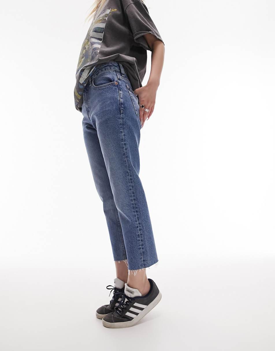 Topshop Petite cropped mid rise straight jeans with raw hems in mid blue