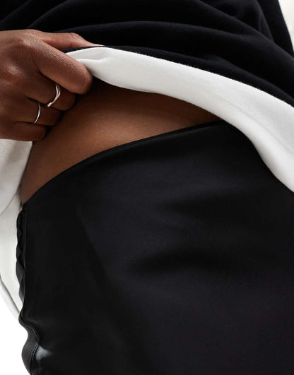 ASOS DESIGN satin bias midi skirt in black