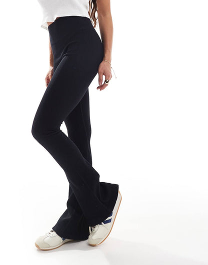 ASOS DESIGN seamless sculpting ribbed flare leggings in black - part of a set