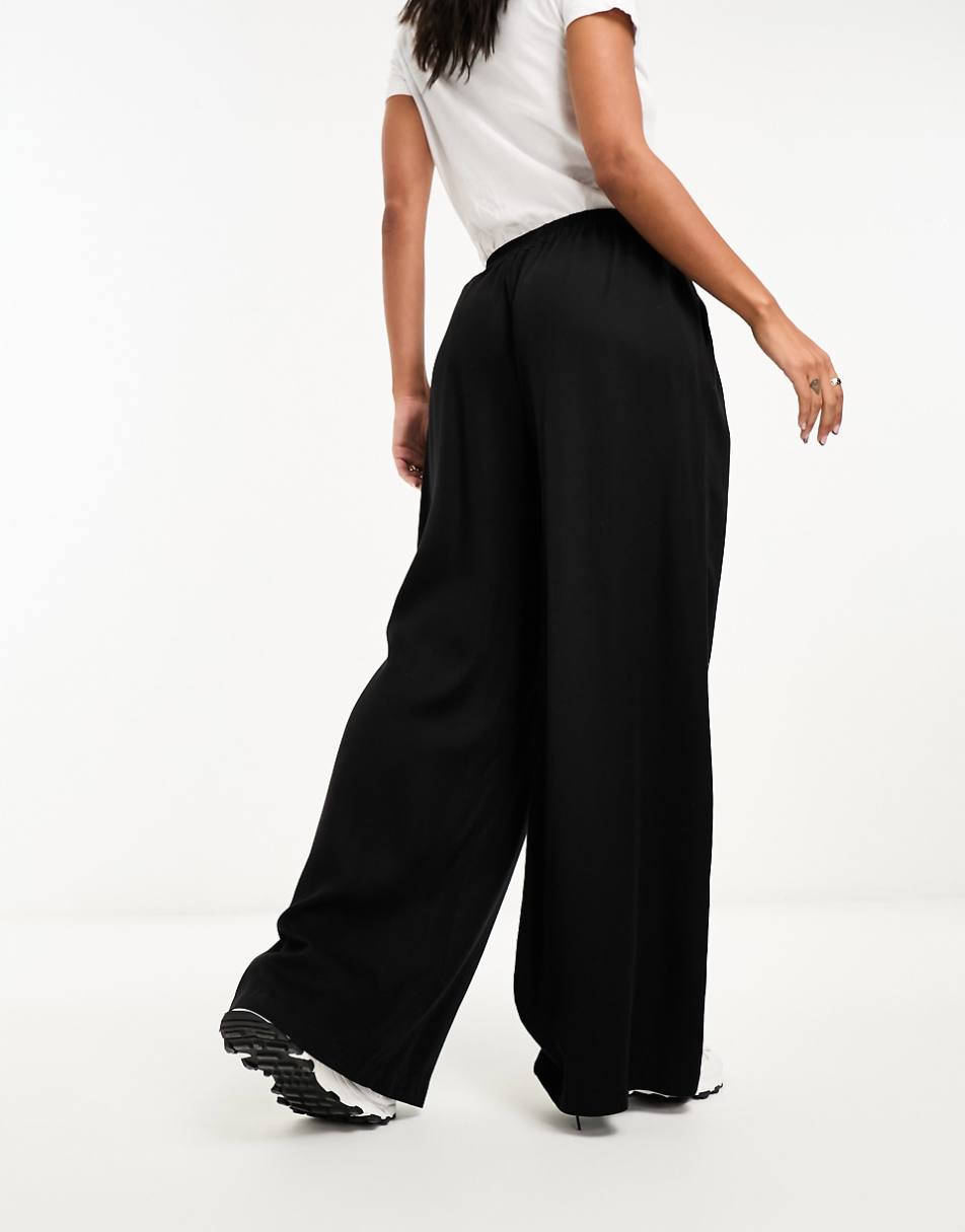 ASOS DESIGN clean front wide leg pants in black