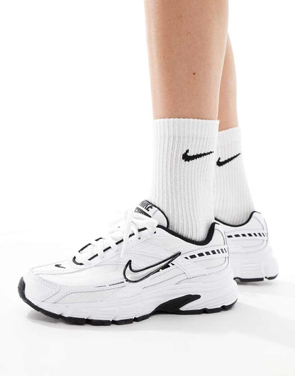 Nike Initiator sneakers in white and silver