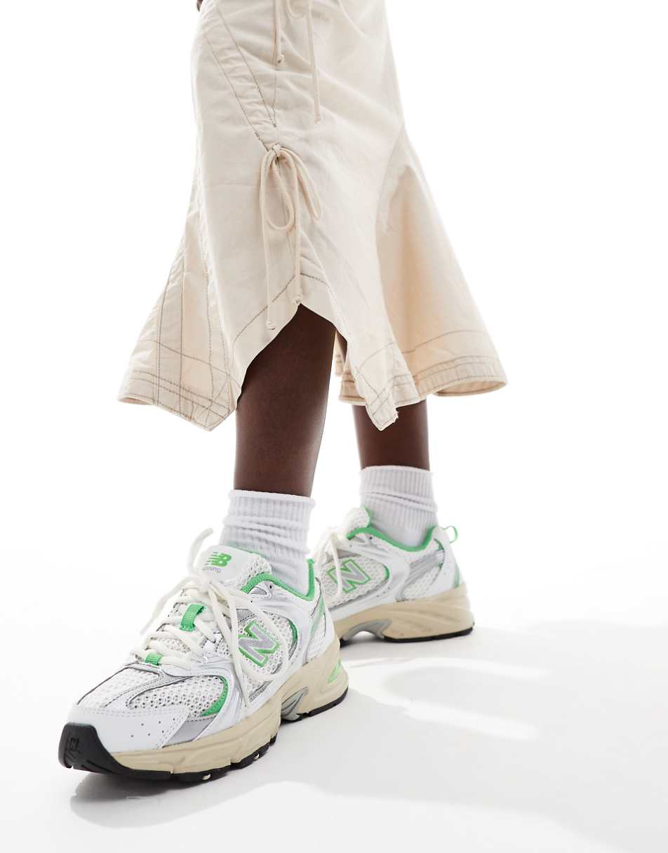 New Balance 530 sneakers in white and green