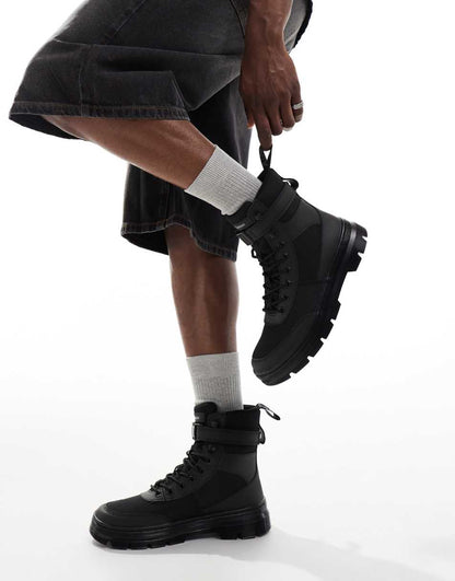 Dr Martens Combs Tech 8 tie boots in black leather