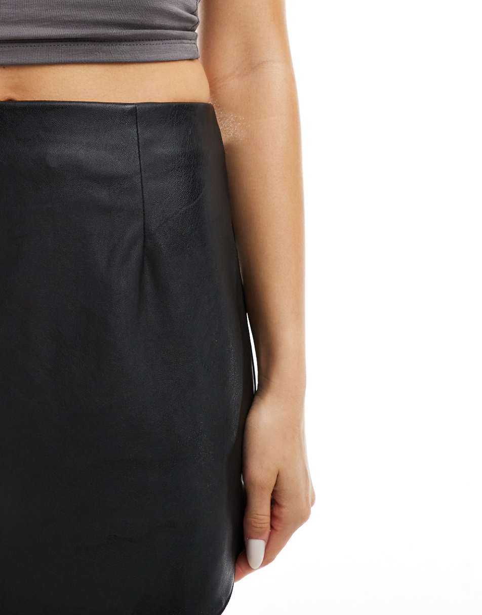 ASOS DESIGN faux leather curved hem mini skirt in black