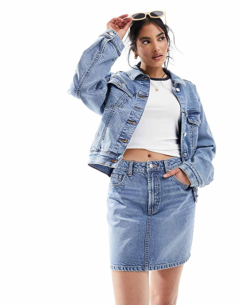 ASOS DESIGN denim high waist mini skirt in midwash blue