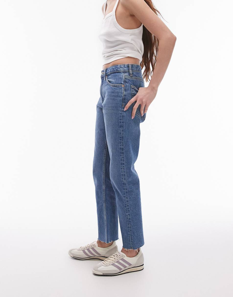 Topshop cropped mid rise straight jeans with raw hems in mid blue