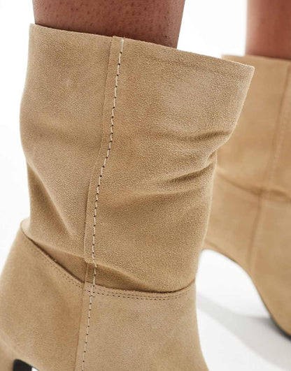 Free People slouchy suede heeled boots in cream