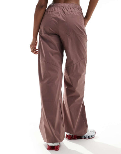 Nike essentials woven pants in purple