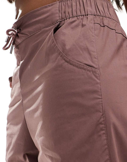 Nike essentials woven pants in purple