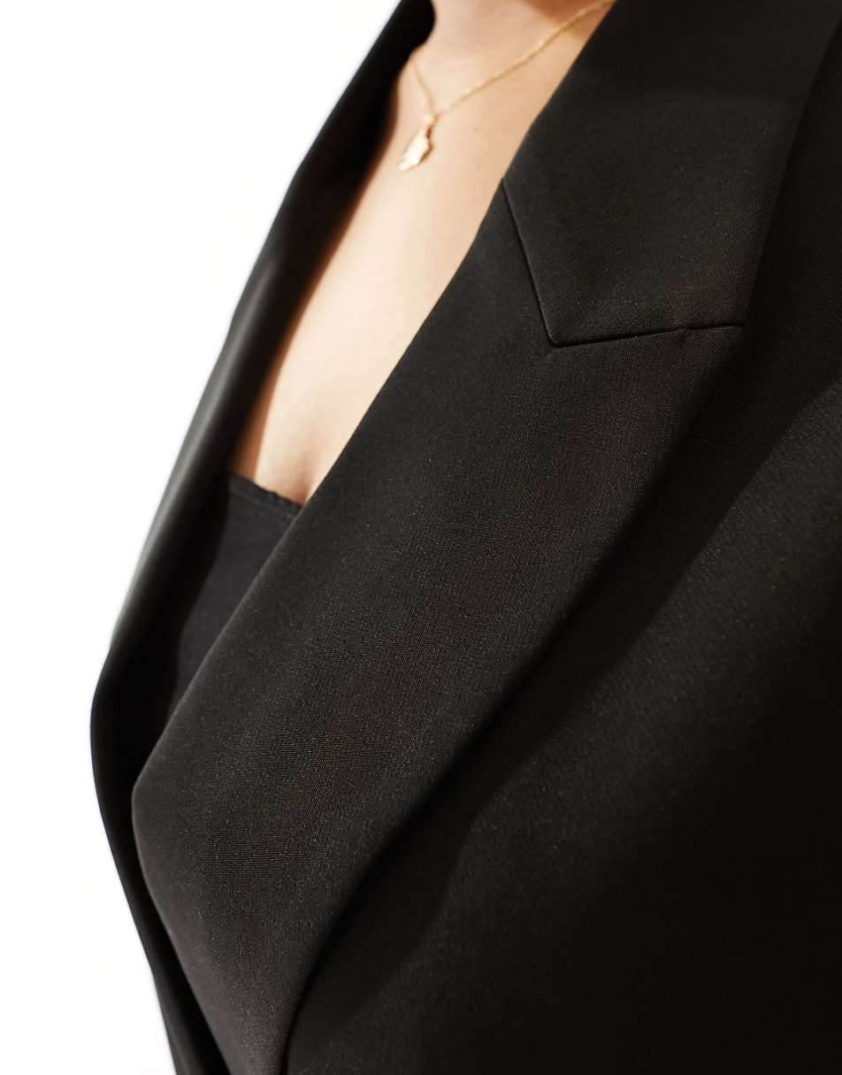 ASOS DESIGN Curve sleeveless tailored blazer with tie waist in black