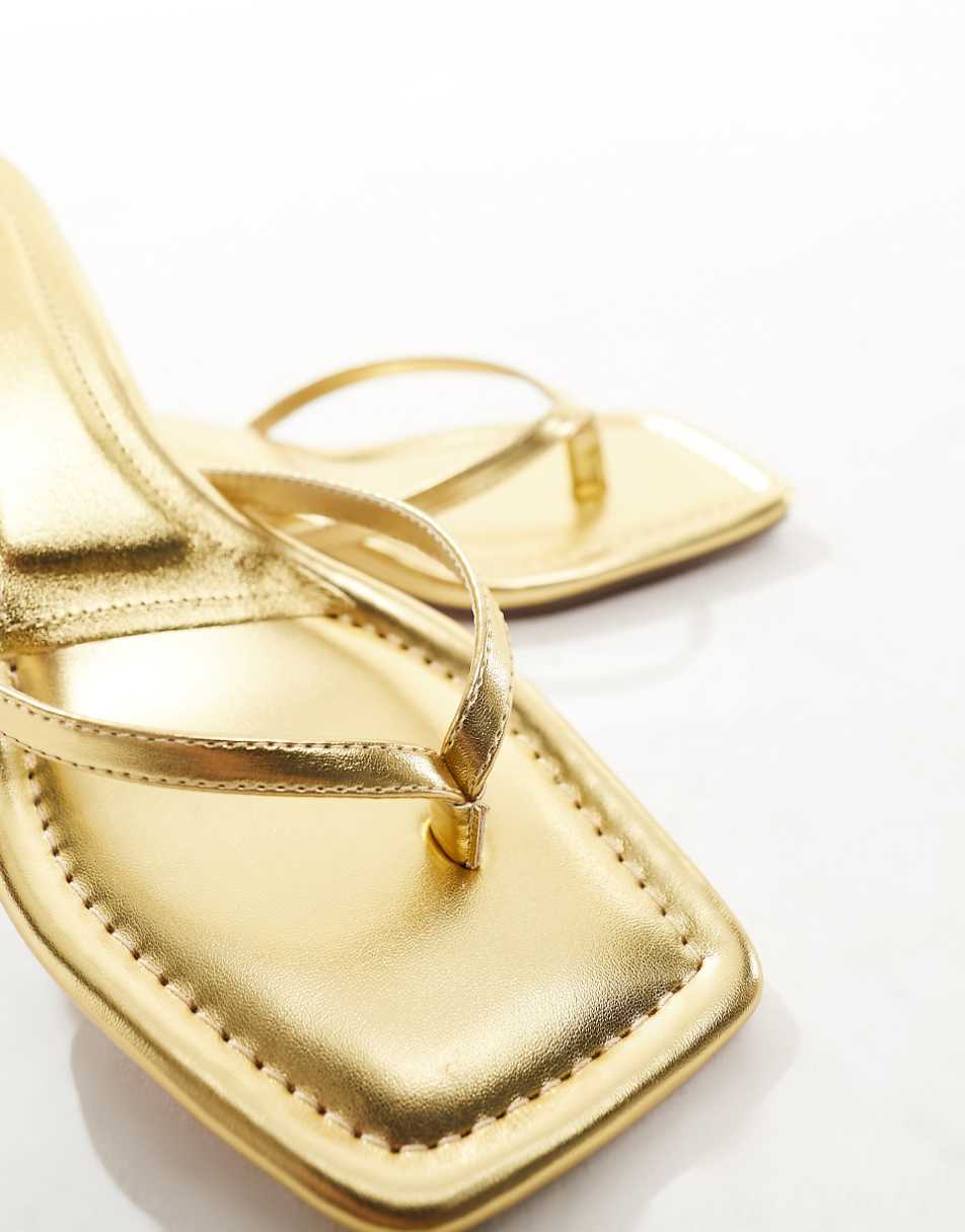 ASOS DESIGN Heatwave toe thong kitten heeled sandals in gold