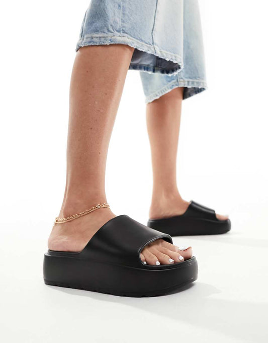 ASOS DESIGN Freedom cleated flatform slides in black