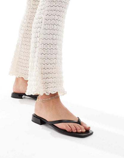 ASOS DESIGN Felicity skinny toe-thong flat sandals in black