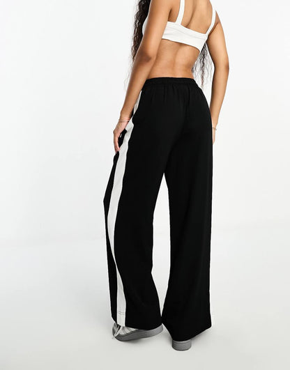 ASOS DESIGN Petite pull on pants with contrast panel in black