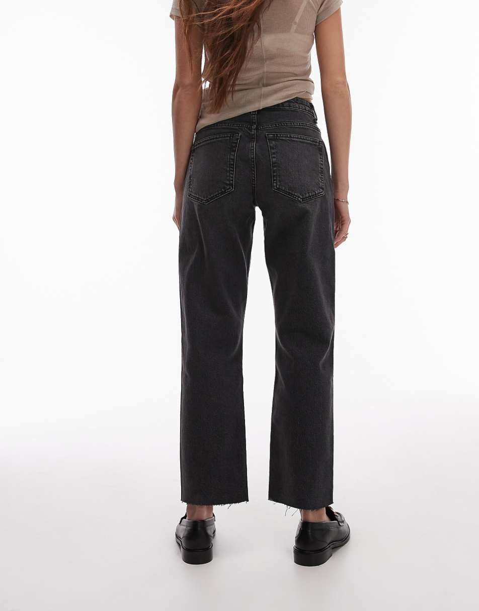 Topshop cropped mid rise straight jeans with raw hems in washed black