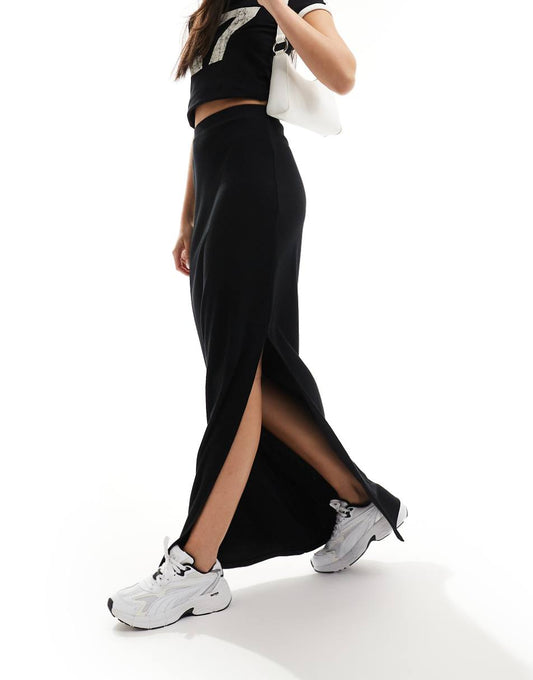 ASOS DESIGN Curve ribbed maxi skirt with side slit in black