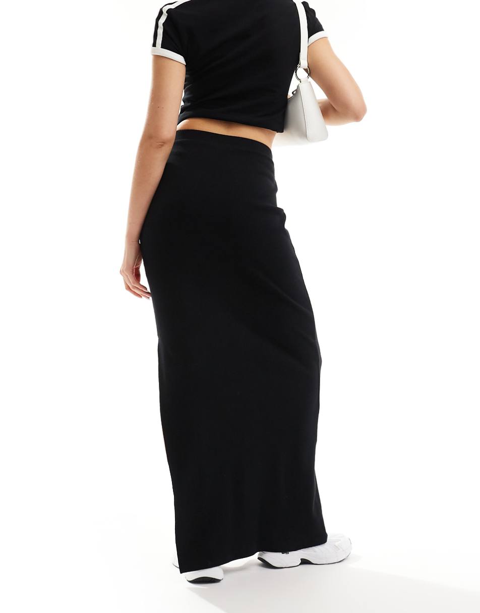 ASOS DESIGN Curve ribbed maxi skirt with side slit in black