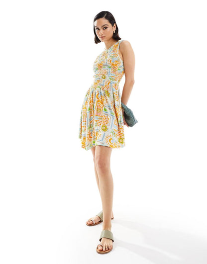 ASOS DESIGN crinkle shirred bodice mini dress with open back in floral abstract print