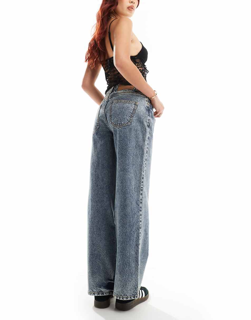 Reclaimed Vintage 00s low rise jean in blue acid wash