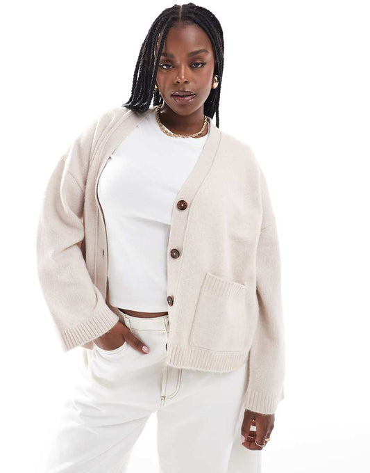 ASOS DESIGN Curve boxy cardigan with V-neck and pocket detail in cream