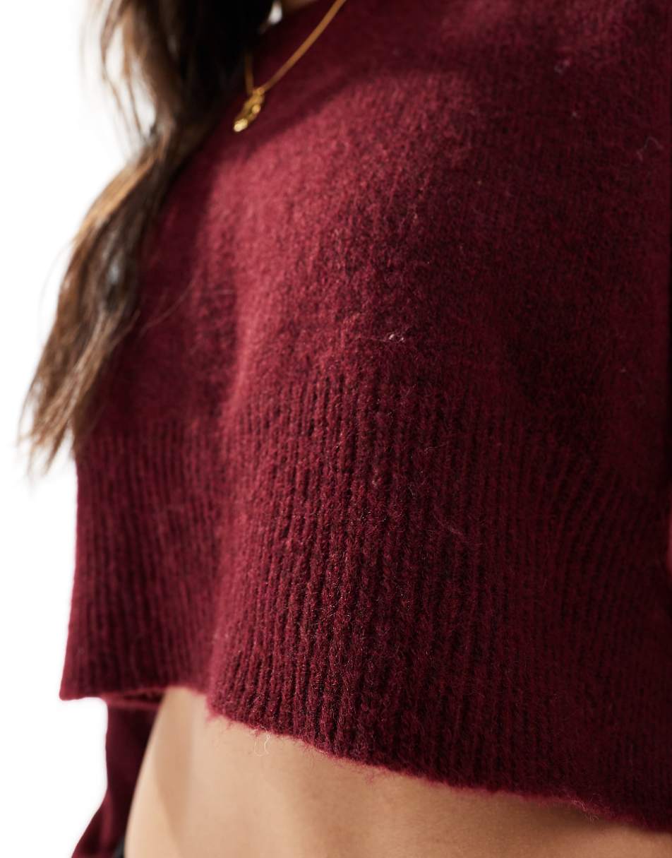 ASOS DESIGN crop crew neck sweater with split hemline in burgundy