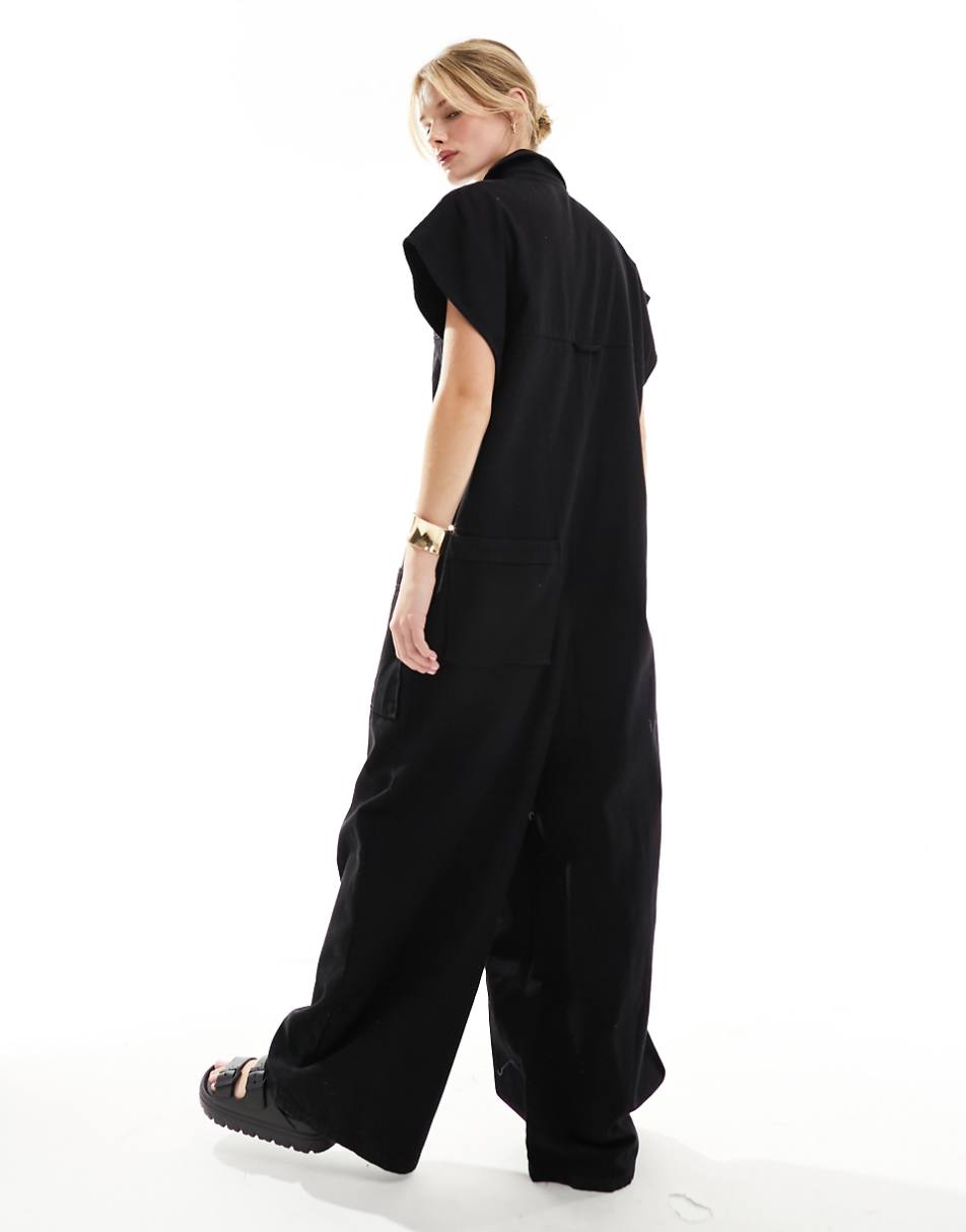 ASOS DESIGN grown on sleeve boiler suit with dropped pockets in black