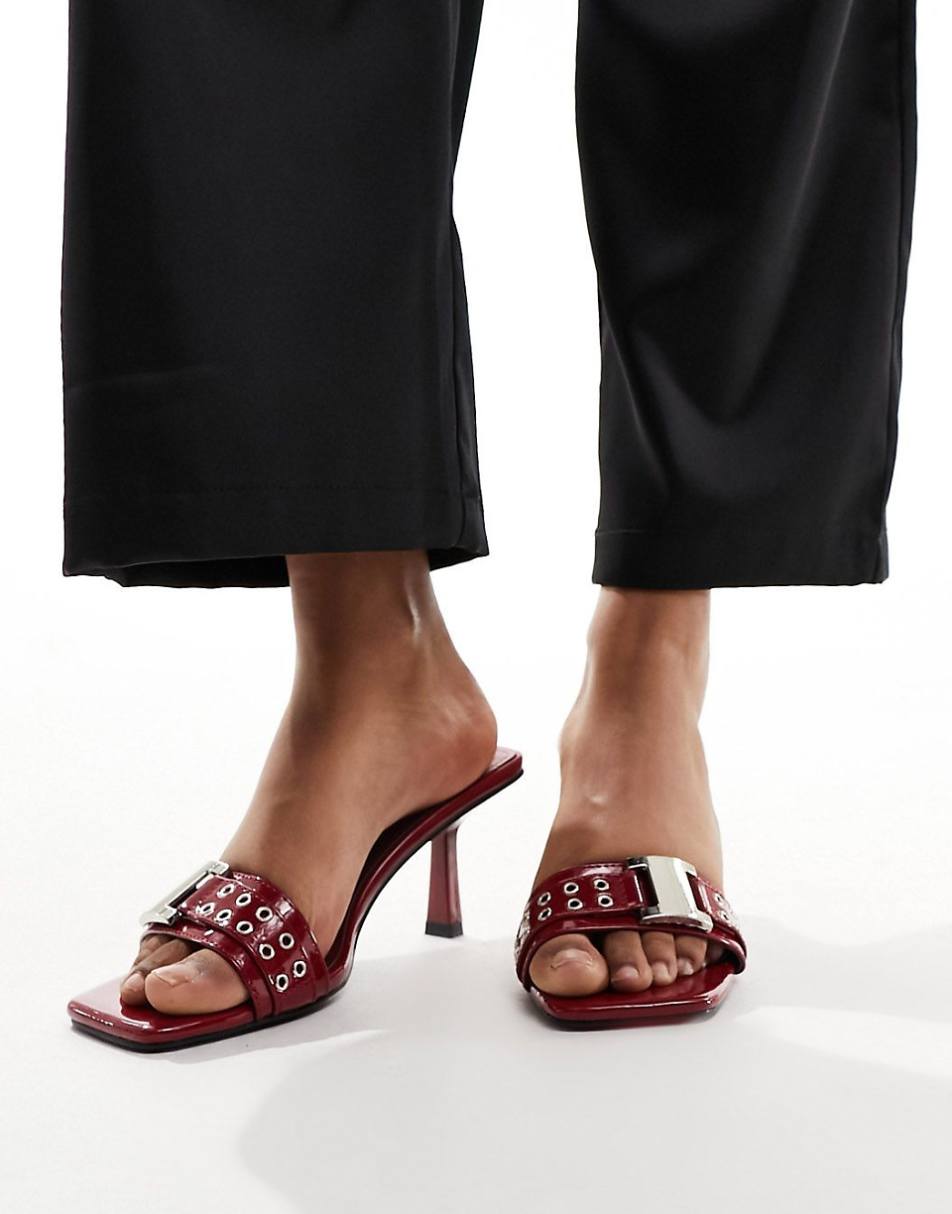 Simmi London Wide Fit Bexley mid heeled mules with grommet buckle detail in red