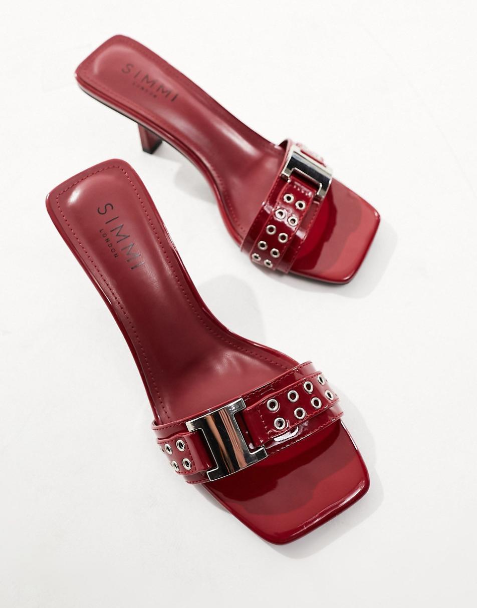 Simmi London Wide Fit Bexley mid heeled mules with grommet buckle detail in red