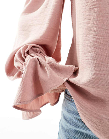 ASOS DESIGN volume sleeve soft shirt with ruffle cuff in pink