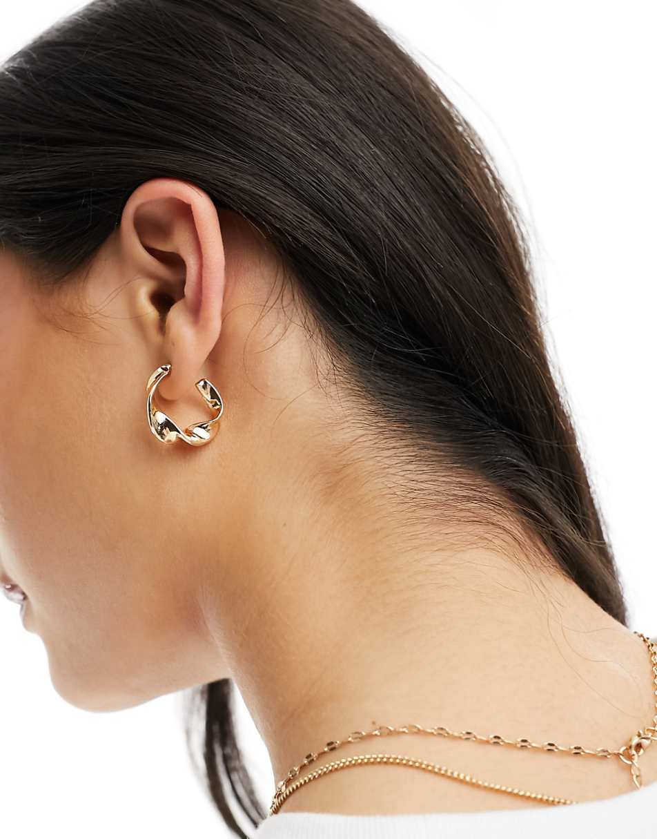 ASOS DESIGN hoop earrings with flat twist design in gold tone