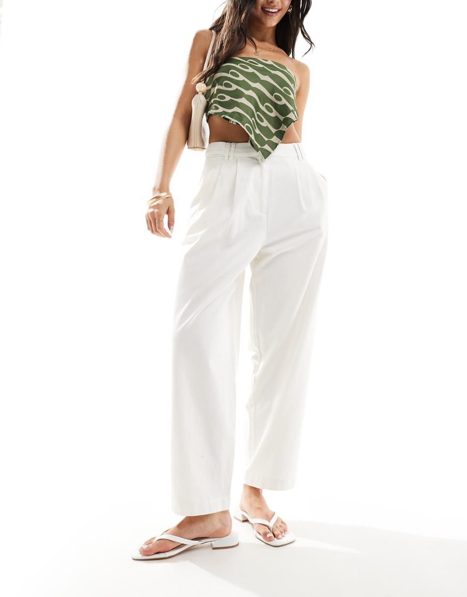 ASOS DESIGN barrel leg chino pants with button tab detail in white