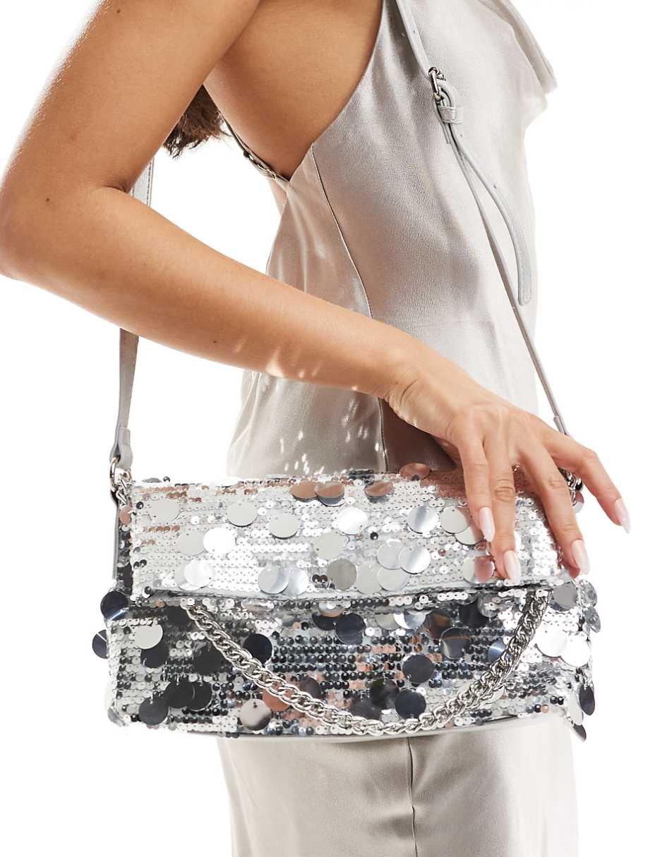 True Decadence sequin clutch bag with crossbody strap in silver