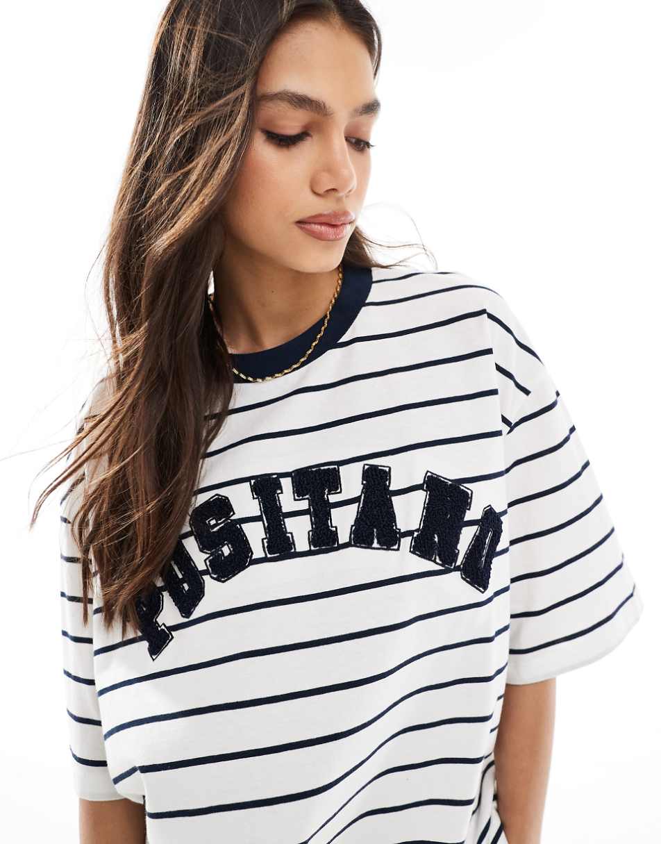 ASOS DESIGN boyfriend fit t-shirt with positano graphic in cream stripe