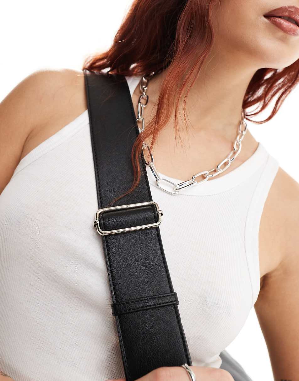 Glamorous asymmetric crossbody bag in black leather look