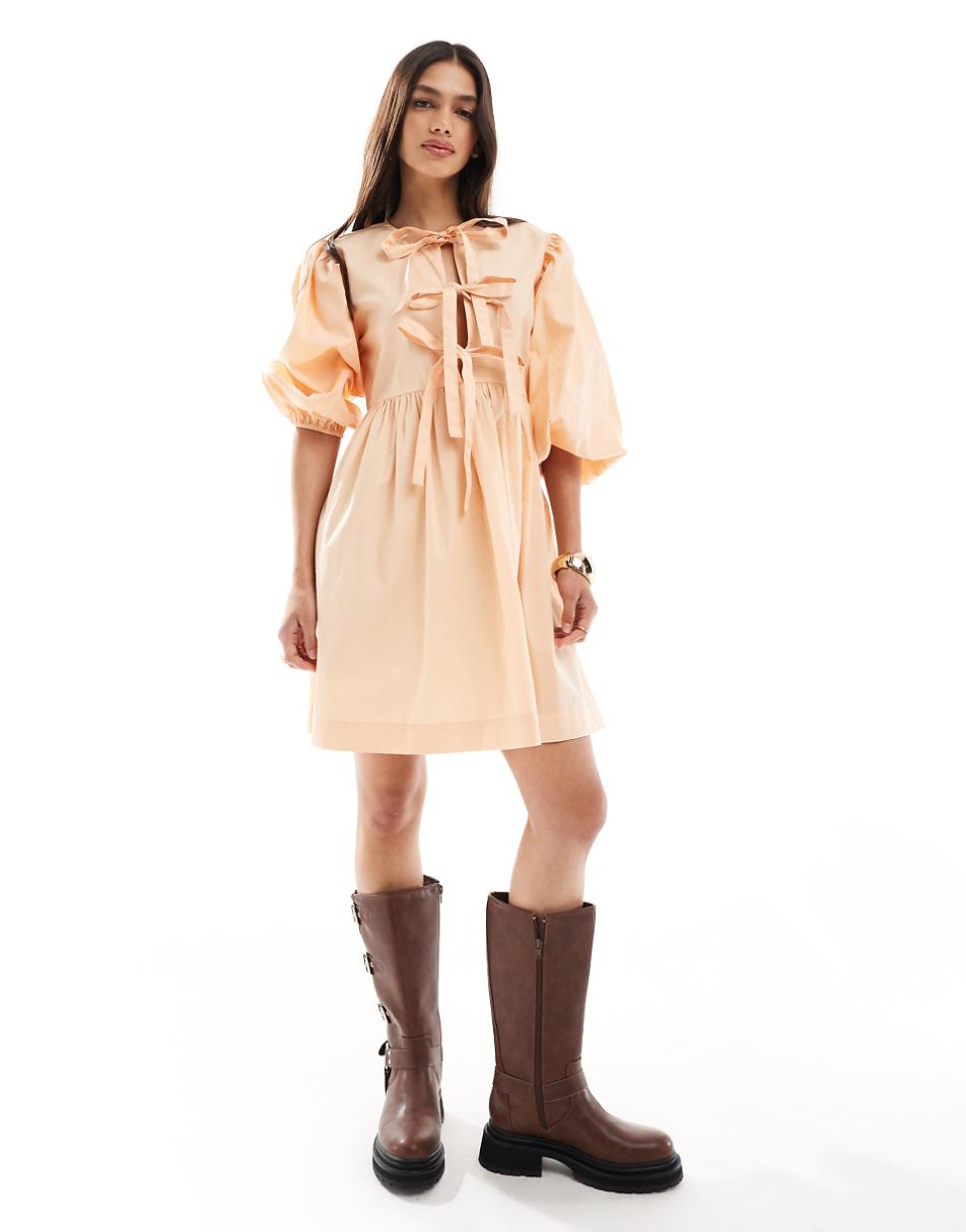 ASOS DESIGN bow tie front mini smock dress in peach fuzz