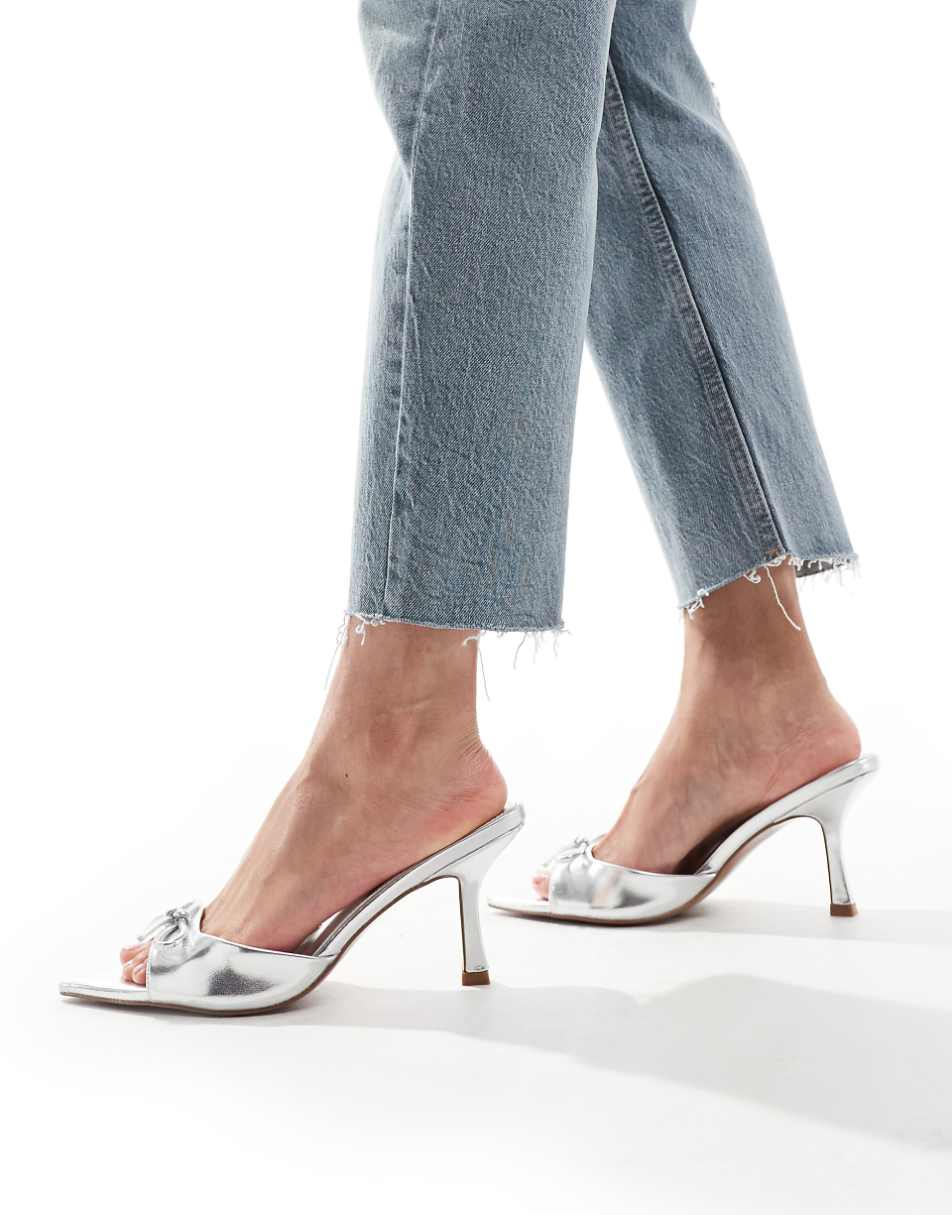 ASOS DESIGN Heyday bow detail pointed sole heeled mules in silver