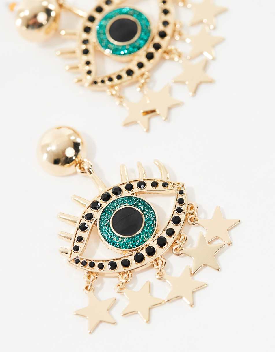 ASOS DESIGN drop earrings with eye and star detail in gold tone