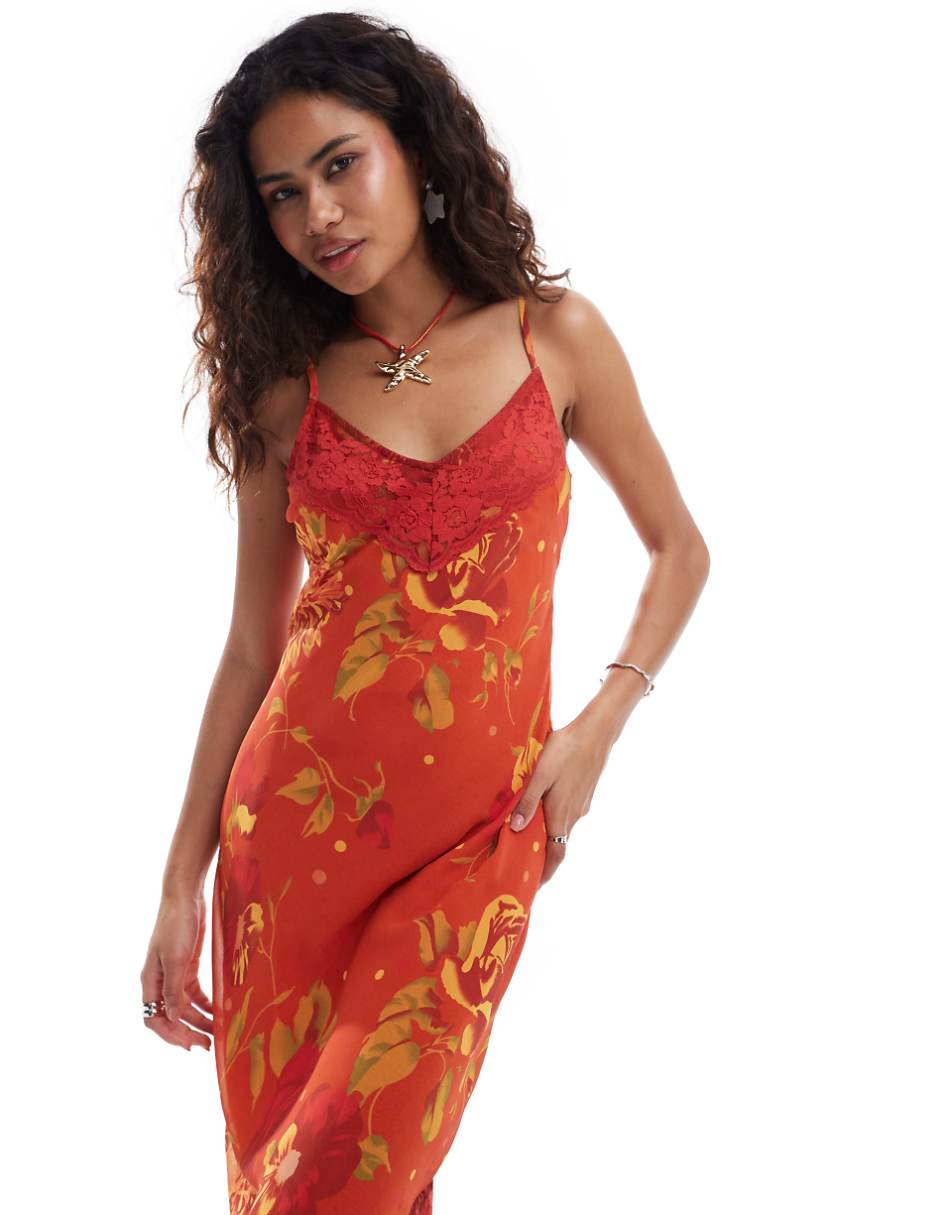 Reclaimed Vintage asymmetric hem cami midi slip dress in orange floral print