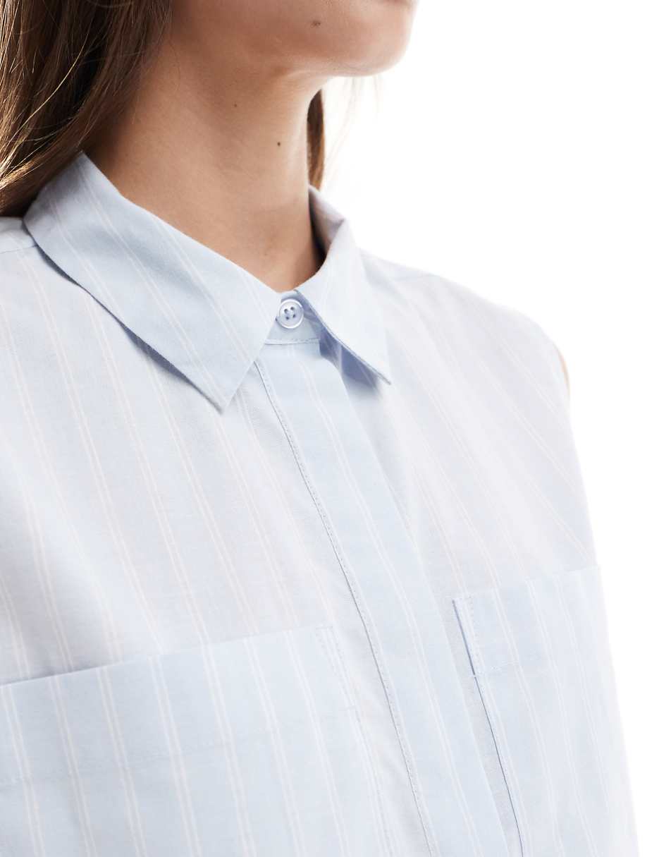 ASOS DESIGN sleeveless cropped shirt in blue and white stripe
