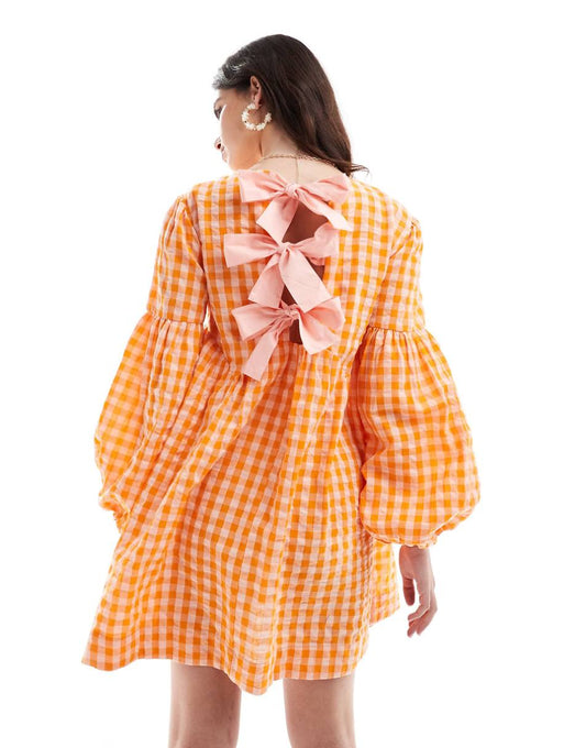 ASOS DESIGN mini textured smock dress in orange and pink gingham