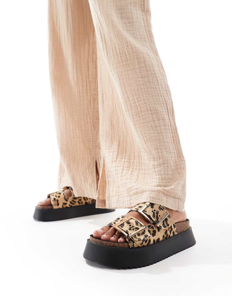 ASOS DESIGN Firecracker double strap footbed flat sandals in leopard