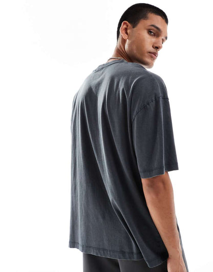 ASOS DESIGN unisex oversized licensed T-shirt with KISS band print in washed black