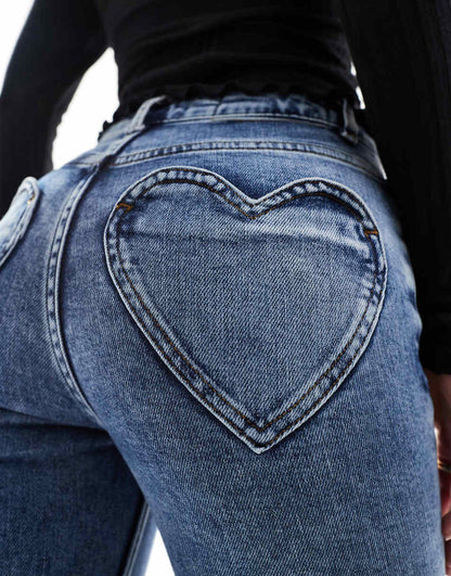 Miss Selfridge Petite heart pocket flare jeans in mid wash