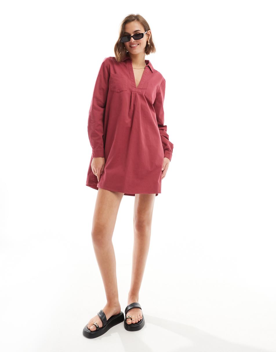 ASOS DESIGN cotton twill pocket shift mini dress with raw hem in raspberry red