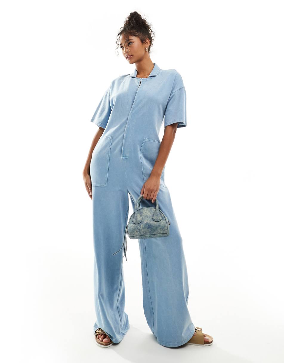 ASOS DESIGN boilersuit with wide leg & pockets in denim wash