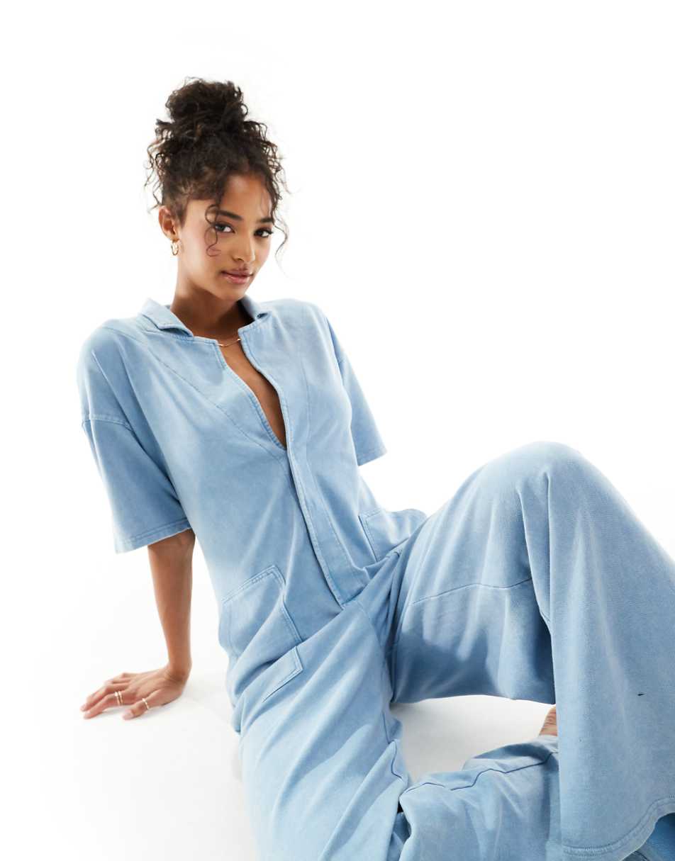 ASOS DESIGN boilersuit with wide leg & pockets in denim wash